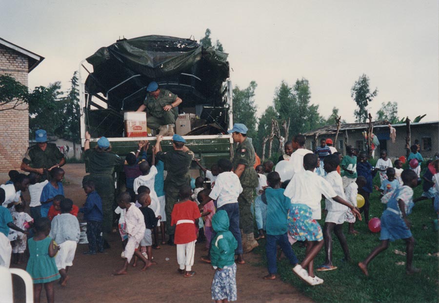 Rwanda 1994 Xmas. Canadian contingent soldiers distributing the clothing, toys, etc., at one of the orphanages. The regimental wives club collected donations for the orphanages from across Canada. They had various air carriers ship the 50 tons of stuff to Nairobi, Kenya. I sent a route recce team from Kigali to Nairobi to test the route and secure places for unit to stay when driving to Mombasa where our vehicles would be shipped by sea back to Canada, as all our vehicles were returning to Canada.